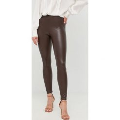 MICHAEL Michael Kors legginsy MU1304Y2S8 damskie kolor brązowy gładkie. Brązowe legginsy MICHAEL Michael Kors, bez wzorów. W wyprzedaży za 537.99 zł.