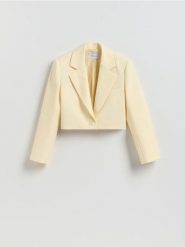 Krótka marynarka - jasnożółty. Żółte marynarki i żakiety Reserved, l, bez wzorów, z tkaniny, bez ramiączek. Za 179.99 zł.