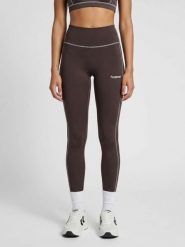 Damskie legginsy Hummel Pulse Retro. Brązowe legginsy Hummel, bez wzorów, z materiału, retro. Za 191.42 zł.