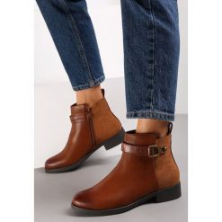 Brązowe Botki Oreithes. Brązowe botki Renee, bez wzorów, ze skóry, za kostkę, bez obcasa, na płaskiej podeszwie, bez zapięcia. W wyprzedaży za 135.99 zł.