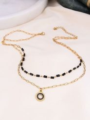 Charlize Pozłacany naszyjnik z cyrkoniami - dł. 50 cm rozmiar: onesize. Czarne naszyjniki Charlize, z materiału, z cyrkonią, pozłacane. Za 83.03 zł.