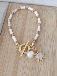 Nakkash Pozłacana bransoletka z kamieniami szlachetnymi rozmiar: onesize. Białe bransoletki Nakkash, z cyrkonią, pozłacane. Za 43.99 zł.