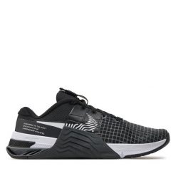 Buty na siłownię Nike. Czarne buty treningowe Nike, bez wzorów, bez zapięcia, na fitness i siłownię. Za 499.99 zł.