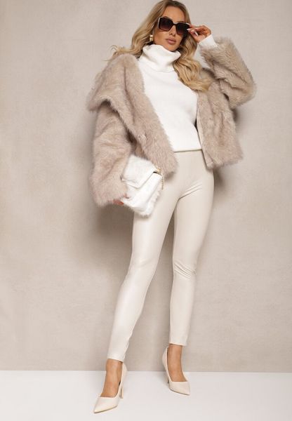 Białe Legginsy z Imitacji Skóry High Waist Ozdobione Wsuwanymi Kieszeniami Valerievia. Białe legginsy Renee, bez wzorów, z jeansu. Za 29.99 zł.