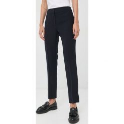 Emporio Armani spodnie damskie kolor granatowy proste high waist. Niebieskie spodnie materiałowe Emporio Armani, bez wzorów, z materiału, z podwyższonym stanem. W wyprzedaży za 1,229.90 zł.