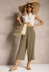 Ciemnozielone Spodnie Palazzo z Gumką w Talii i Długością Nogawki 3/4 Moolia. Zielone jeansy Renee, plus size, bez wzorów, z jeansu. W wyprzedaży za 29.99 zł.