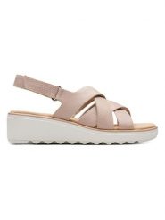 Clarks Skórzane sandały w kolorze jasnoróżowym na koturnie rozmiar: 39. Różowe sandały Clarks, bez wzorów, ze skóry, z otwartym noskiem, bez obcasa, na koturnie, bez zapięcia. Za 125.27 zł.