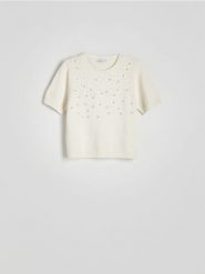 Dzianinowa bluzka - kremowy. Białe bluzki Reserved, l, bez wzorów, z bawełny, bez kołnierzyka, bez ramiączek. W wyprzedaży za 79.99 zł.