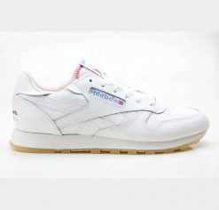 Damskie buty sportowe sportowa estetyka CLASSIC SNEAKERS. Białe buty treningowe Reebok, bez wzorów, bez zapięcia, trekkingowe, reebok classic. Za 405.00 zł.
