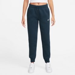Spodnie sportowe damskie Nike Nsw Phnx Flc. Niebieskie spodnie dresowe Nike, bez wzorów, z dresówki, długie. Za 405.00 zł.