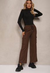 Brązowe Szerokie Spodnie Dresowe Cargo High Waist w Stylu Cargo z Ociepleniem Sevifra. Brązowe jeansy Renee, bez wzorów, z dresówki, z podwyższonym stanem, długie. W wyprzedaży za 43.99 zł.