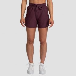 Szorty damskie fitness regular z kieszeniami bakłażanowe TRN. Czerwone szorty sportowe GYMBEAM, bez wzorów, z elastanu, do biegania. Za 73.90 zł.