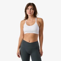 Biustonosz treningowy damski Swedemount Core Strap Bra oddychający. Białe biustonosze sportowe SWEDEMOUNT, bez wzorów, z tkaniny, na fitness i siłownię. Za 79.99 zł.