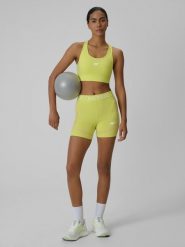 4F Legginsy krótkie treningowe damskie - żółte XL. Żółte legginsy 4f, bez wzorów, z materiału, krótkie. Za 99.99 zł.