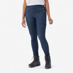 Legginsy trekkingowe damskie Forclaz MT900. Niebieskie legginsy FORCLAZ, bez wzorów, z bawełny, sportowe. Za 199.99 zł.