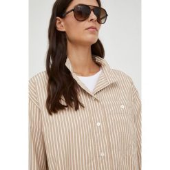 Marc O'Polo koszula damska kolor beżowy relaxed ze stójką. Brązowe koszule Marc O'Polo, bez wzorów, z bawełny, bez kołnierzyka, bez ramiączek. Za 429.99 zł.