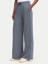 Guess Spodnie dresowe V6YB27 K5181 Granatowy Relaxed Fit. Niebieskie spodnie dresowe Guess, z aplikacjami, z dresówki. Za 426.99 zł.