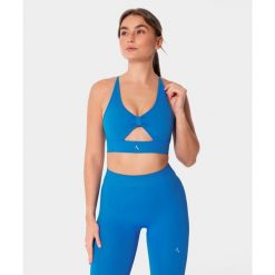 Bezszwowy biustonosz sportowy z wycięciem Carpatree Eris. Niebieskie biustonosze sportowe Carpatree, bez wzorów, prążkowane, na fitness i siłownię. Za 149.99 zł.