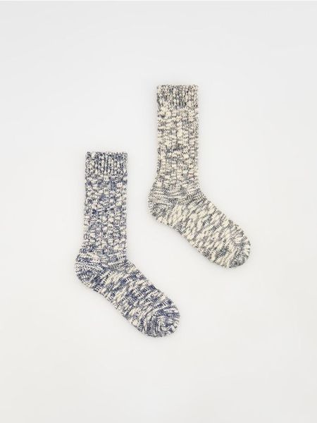 Bawełniane skarpetki 2 pack - granatowy. Niebieskie skarpetki Reserved, bez wzorów, z bawełny. W wyprzedaży za 17.99 zł.
