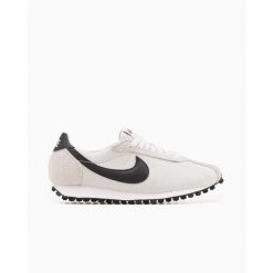 Buty Sportowe Damskie Nike W Ld‑1000. Białe buty do biegania Nike, bez wzorów, bez zapięcia, do biegania. Za 303.60 zł.