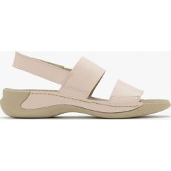 Różowe sandały SONIA. Czerwone sandały Ryłko, bez wzorów, z gumy, bez obcasa, na płaskiej podeszwie, bez zapięcia. Za 229.99 zł.