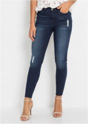 Dżinsy o kroju skinny ze średnim stanem, krótsza nogawka. Niebieskie jeansy bonprix, bez wzorów, z jeansu, krótkie. Za 127.99 zł.