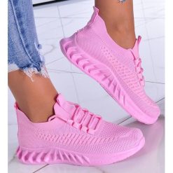 Pantofelek24 Wsuwane różowe buty sportowe /E3-3 11874 T391/ 37. Czerwone buty sportowe lifestyle Pantofelek24, bez wzorów, bez zapięcia. Za 69.90 zł.