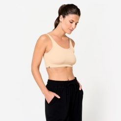 Stanik sportowy Kimjaly. Brązowe biustonosze sportowe Decathlon, bez wzorów, z elastanu, na jogę i pilates. Za 69.99 zł.