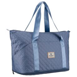 Treningowa torba wykonana z poliestru w niebieskim kolorze, wyposażona w uchwyt na walizkę Peterson PTN PIK-02. Niebieskie torby sportowe Peterson, bez wzorów. Za 89.99 zł.