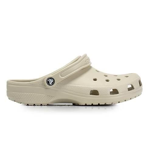 Klapki dla dorosłych Crocs Classic. Brązowe klapki Crocs, bez wzorów, z materiału, sportowe, bez obcasa, bez zapięcia. Za 266.00 zł.