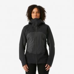 Kurtka trekkingowa damska Forclaz MT900 wodoodporna. Czarne kurtki FORCLAZ, l, bez wzorów, z materiału, sportowe, bez kaptura. Za 649.99 zł.