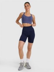 4F Legginsy kolarki treningowe damskie - granatowe M. Niebieskie legginsy 4f, bez wzorów, z dzianiny, sportowe, krótkie. W wyprzedaży za 89.99 zł.