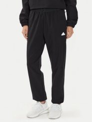 Adidas Spodnie dresowe City Escape IT8814 Czarny Regular Fit. Czarne spodnie dresowe adidas, bez wzorów, z dresówki. Za 209.99 zł.