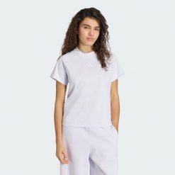 KOSZULKA SOFT LUX. Fioletowe t-shirty sportowe adidas, xl, bez wzorów, z bawełny, bez ramiączek, na fitness i siłownię. Za 149.00 zł.