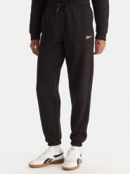 Reebok Spodnie dresowe Reebok X Ewa Chodakowska Evren RK25308CCW Czarny Regular Fit. Czarne spodnie sportowe Reebok, bez wzorów, z dresówki. Za 179.99 zł.