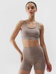 4F Biustonosz treningowy z niskim wsparciem z materiału z recyklingu damski - beżowy L. Brązowe biustonosze sportowe 4f, bez wzorów, z dzianiny, na fitness i siłownię. W wyprzedaży za 59.99 zł.