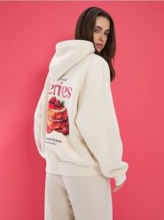 Bluza hoodie z nadrukiem - kremowy. Białe bluzy Sinsay, l, bez wzorów, bez ramiączek, bez kaptura. Za 49.99 zł.