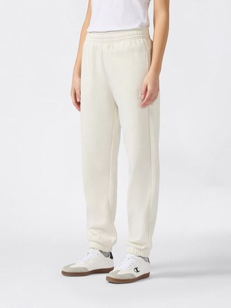 Champion Spodnie dresowe w kolorze kremowym rozmiar: L. Brązowe spodnie sportowe Champion, bez wzorów, z bawełny. Za 118.01 zł.