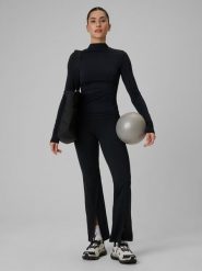 4F Spodnie treningowe z rozszerzanymi nogawkami damskie - czarne M. Czarne spodnie dresowe 4f, bez wzorów, ze skóry, długie. Za 169.99 zł.