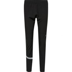 Legginsy damskie Newline Portland. Czarne legginsy Newline, bez wzorów, z materiału, klasyczne. Za 319.00 zł.