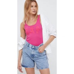 GAP top damski kolor różowy. Czerwone topy GAP, m, bez wzorów, z dzianiny, bez kołnierzyka, bez ramiączek. Za 69.99 zł.