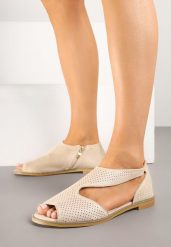 Złote Sandały z Wkładką ze Skóry Naturalnej Zdobione Perforacją Annorin. Żółte sandały Renee, z aplikacjami, ze skóry, eleganckie, bez obcasa, na płaskiej podeszwie, bez zapięcia. Za 119.99 zł.