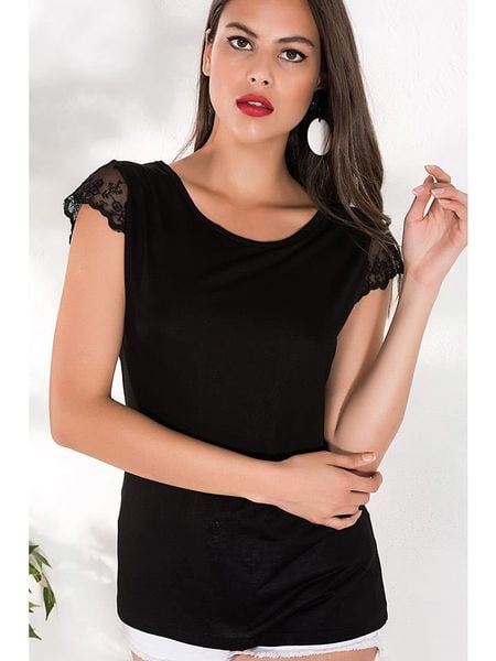 Milan Kiss Bluzka w kolorze czarnym rozmiar: XL. Czarne bluzki Milan Kiss, xl, bez wzorów, z koronki, bez kołnierzyka, bez ramiączek. Za 87.81 zł.