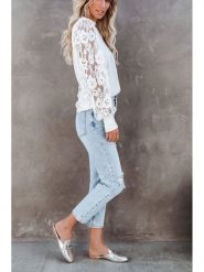 Milan Kiss Bluzka w kolorze białym rozmiar: L. Białe bluzki Milan Kiss, l, bez wzorów, z koronki, bez kołnierzyka, bez ramiączek. Za 126.75 zł.