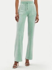 Juicy Couture Spodnie dresowe Del Ray JCAP180 Niebieski Regular Fit. Niebieskie spodnie dresowe Juicy Couture, bez wzorów, z dresówki. Za 359.99 zł.