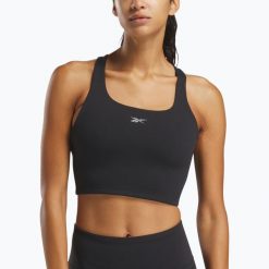 Koszulka Reebok Lux Tank. Czarne topy sportowe REEBOK FITNESS, bez wzorów, na fitness i siłownię. Za 179.99 zł.