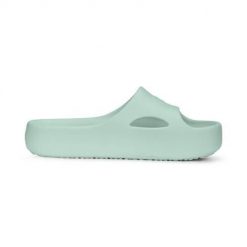 Klapki damskie Puma Shibusa. Zielone klapki Puma, bez wzorów, z materiału, sportowe, bez obcasa, bez zapięcia. Za 189.00 zł.