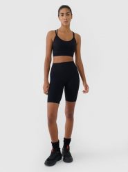 4F Legginsy kolarki bezszwowe treningowe damskie - czarne XS/S. Czarne legginsy 4f, bez wzorów, z dzianiny, klasyczne, krótkie. W wyprzedaży za 89.99 zł.