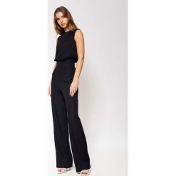 Elegancki Kombinezon z Guzikami na Plecach - Czarny. Czarne kombinezony Nife, l, bez wzorów, z elastanu, eleganckie, bez kołnierzyka, bez ramiączek. Za 259.90 zł.