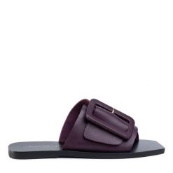 Klapki Eva Longoria. Fioletowe klapki Eva Longoria, bez wzorów, bez obcasa, bez zapięcia. Za 399.99 zł.